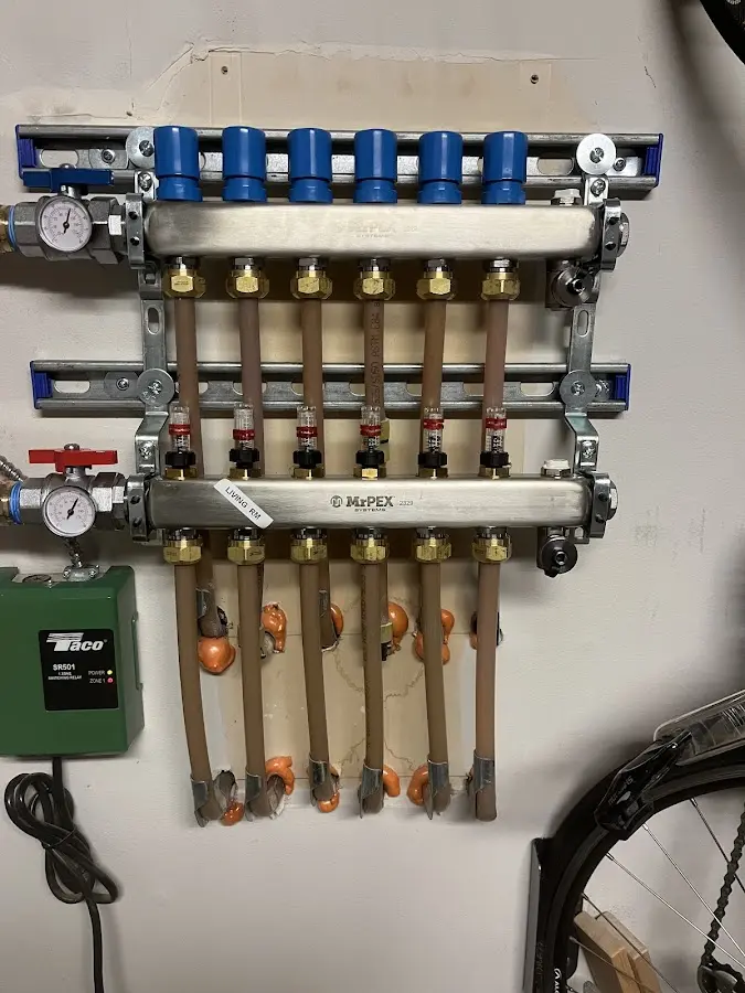 Plumber performing Leak Detection at a residential property in Negaunee