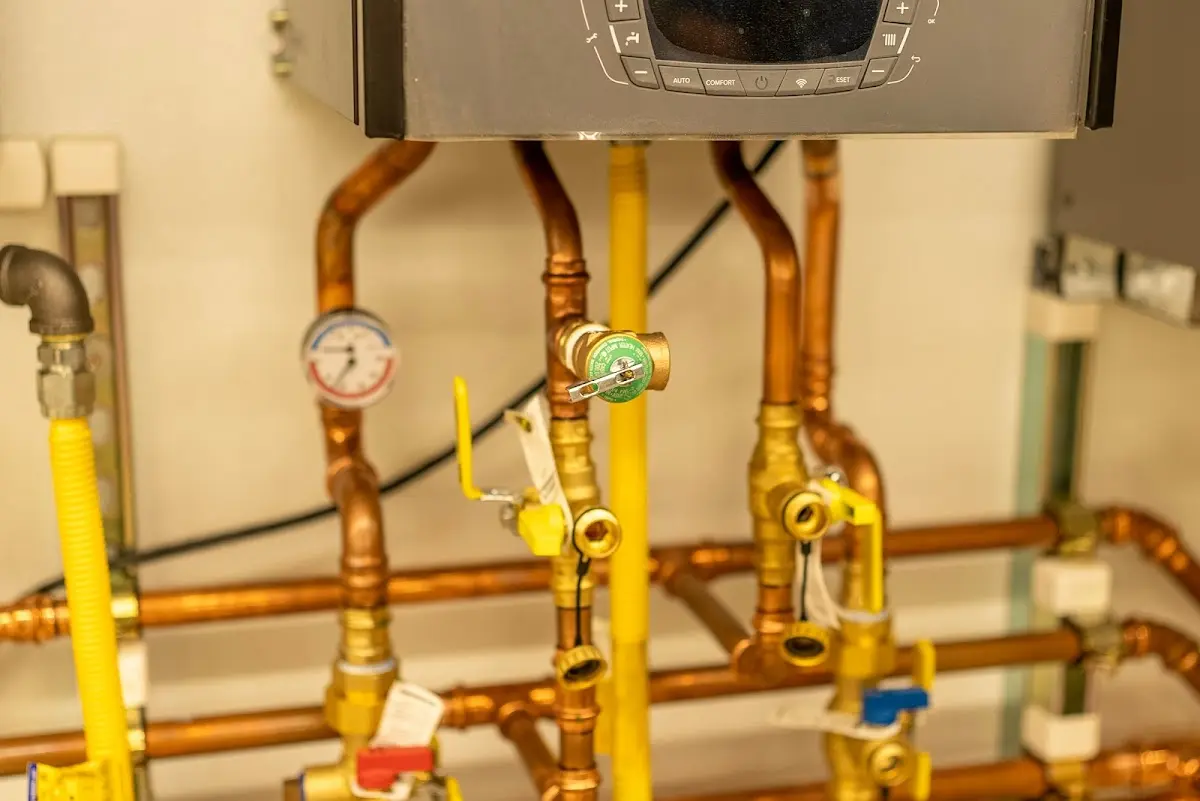 Licensed technician providing Backflow Prevention for a homeowner in Negaunee